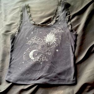 Grey tank top with moon and sun and quote “love by the moon live by the sun”